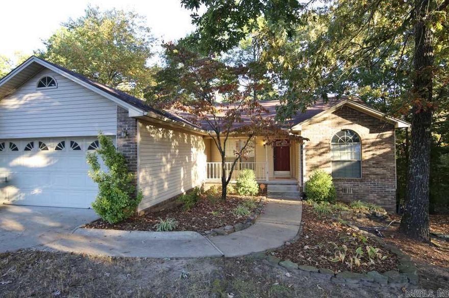 Great west LR home in the heart of everything for under $160,000!  1 level, 3 br, 2 bath w 2 car garage w auto opener.  Neighborhood pool & tennis court if you want to join--no mandatory fee. Backs up to wooded greenbelt! Big, wood fenced yard. Hardwood floors in great room & Master Bedroom.  Tile floors in kitchen & baths.  Updated kitchen, baths, paint, flooring.  New AC.  Shows great!