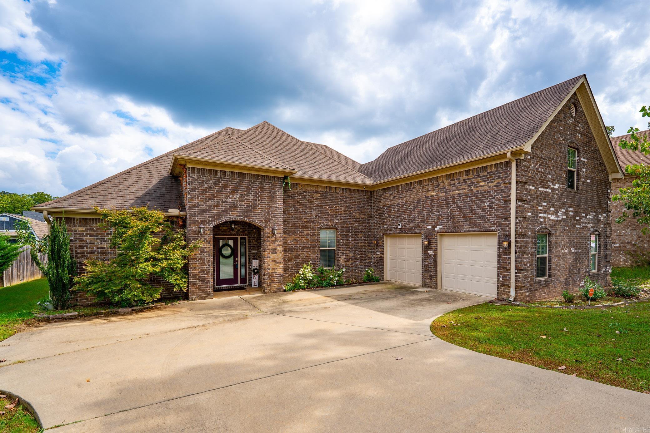 Welcome to this stunning all-brick home offering modern style and everyday comfort! Step inside to a bright and semi-open floor plan with soaring ceilings, wood-look tile flooring, and elegant archways. The spacious living area flows seamlessly into the gourmet kitchen, complete with granite countertops, subway tile backsplash, stainless steel appliances, and pantry. The primary suite is a true retreat, featuring a huge custom walk-in shower and plenty of closet space. Upstairs, a large bonus room can serve as a 4th bedroom, media room, or home office. Enjoy mornings and evenings on the screened-in porch overlooking the backyard. Additional highlights include solar panels (to be paid off at closing), an oversized 2-car garage, and an energy-efficient design. Conveniently located, this home combines style, space, and savings—ready for its next owner! See agent remarks.