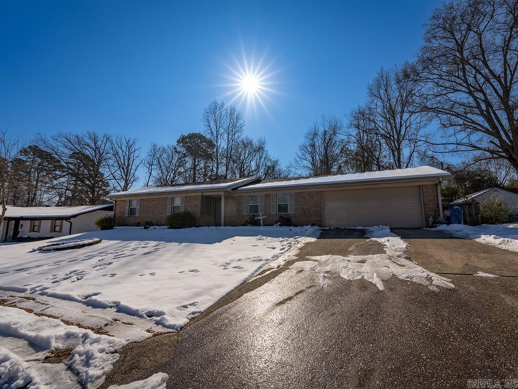This newly remodeled home is turn key ready. It is located in the heart of Bryant. It features 3 bedrooms, 2 full baths, 2 large living areas; a fireplace; covered patio, and a large backyard for fun in the sun.