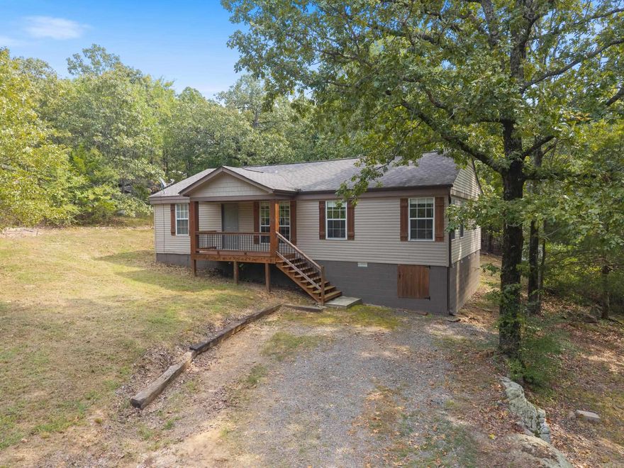 This 3-bedroom, 2-bath home sits on just over half an acre, offering the convenience of being near Conway’s city limits while still providing that out-of-town country feel! Featuring modern updates, stylish finishes, and well-kept original hardwood floors, this home is truly move-in ready. The split floor plan includes a primary suite with a private bath and walk-in closet, separated by a versatile bonus room. Whether you need an office, sitting area, or flex space, this layout gives you options to fit any lifestyle. From the kitchen, you can step onto the covered back deck, where you can enjoy the private backyard, complete with a small metal shed for extra storage. Major updates add peace of mind: the roof, HVAC, water heater, and vinyl siding were all replaced in 2018, and the dishwasher in 2022. This property is ready for its next owners—schedule your showing today!