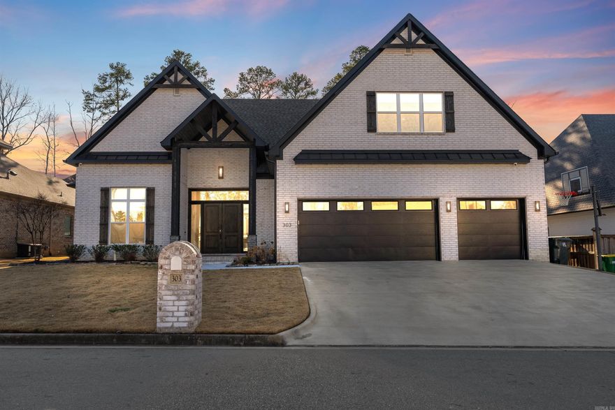 Discover timeless elegance in this custom-built home situated in the sought-after Chenal Valley "Ensbury" neighborhood offering access to the Chenal Country Club golf course by cart paths. The welcoming foyer features soaring 12ft ceilings, beautiful hardwood floors, and an open-concept design. The great room is bathed in natural light from oversized windows and features built-in bookcases. Gourmet kitchen designed for a culinary enthusiast who will appreciate the appliances:gas cooktop with pot filler, Thermador double ovens, built-in refrigerator & freezer, KitchenAid ice machine, microwave drawer and walk-in pantry. Dining room offers access to the patio and overlooks the backyard. Main level features an office with built-in bookcases, primary bedroom suite, guest suite, half bath, mud room and laundry service. Upstairs features 3 bedrooms and 2.5 bathrooms, game room with wet bar and den. The outdoor living space is equally impressive with a large covered patio with motorized screens, a built-in grill, cabinet ready for your TV overlooking the fenced backyard which backs up to green space.