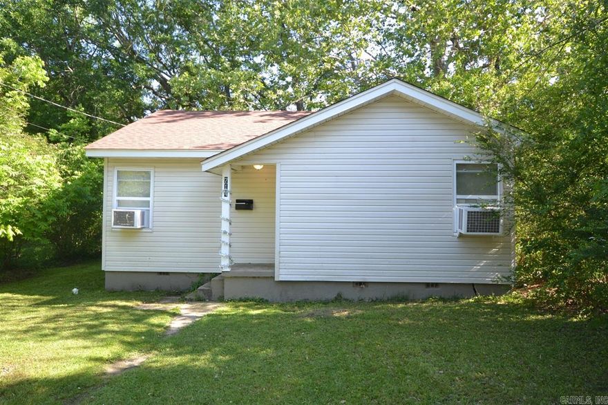 For more information or to schedulae a showing please call Michael Woods, 903-824-6715 or Ray & Associates, 870-234-1644.    Square footage is per county tax records. If exact square footage is desired, please have independently measured.