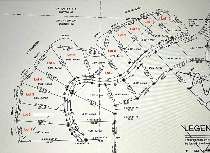 Wooded lot on Lake Hamilton with 137' of Lake Frontage.  Lakeside School District.