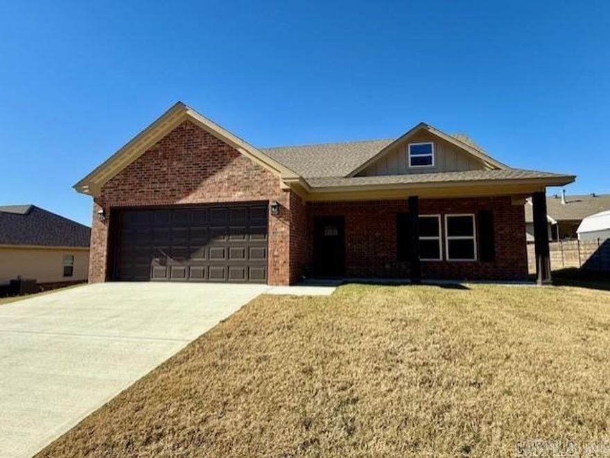 This new construction is perfect for you! It's move-in ready and located in the Lake Hamilton School District. The subdivision is close to the school, which is super convenient. Inside, you'll find vinyl plank flooring and beautiful granite countertops in the kitchen and bathrooms. The soft close drawers and cabinets add a touch of luxury. The primary bath even has his and hers closets! Outside, there's a covered back porch and all new sodded lawn (just put down). Plus, the community offers a pool and a basketball court for you to enjoy. And don't forget, there's a 1-year builder's warranty for peace of mind. It's a dream home! Seller is helping make ownership more affordable - offering closing cost assistance or an interest rate buy down option.