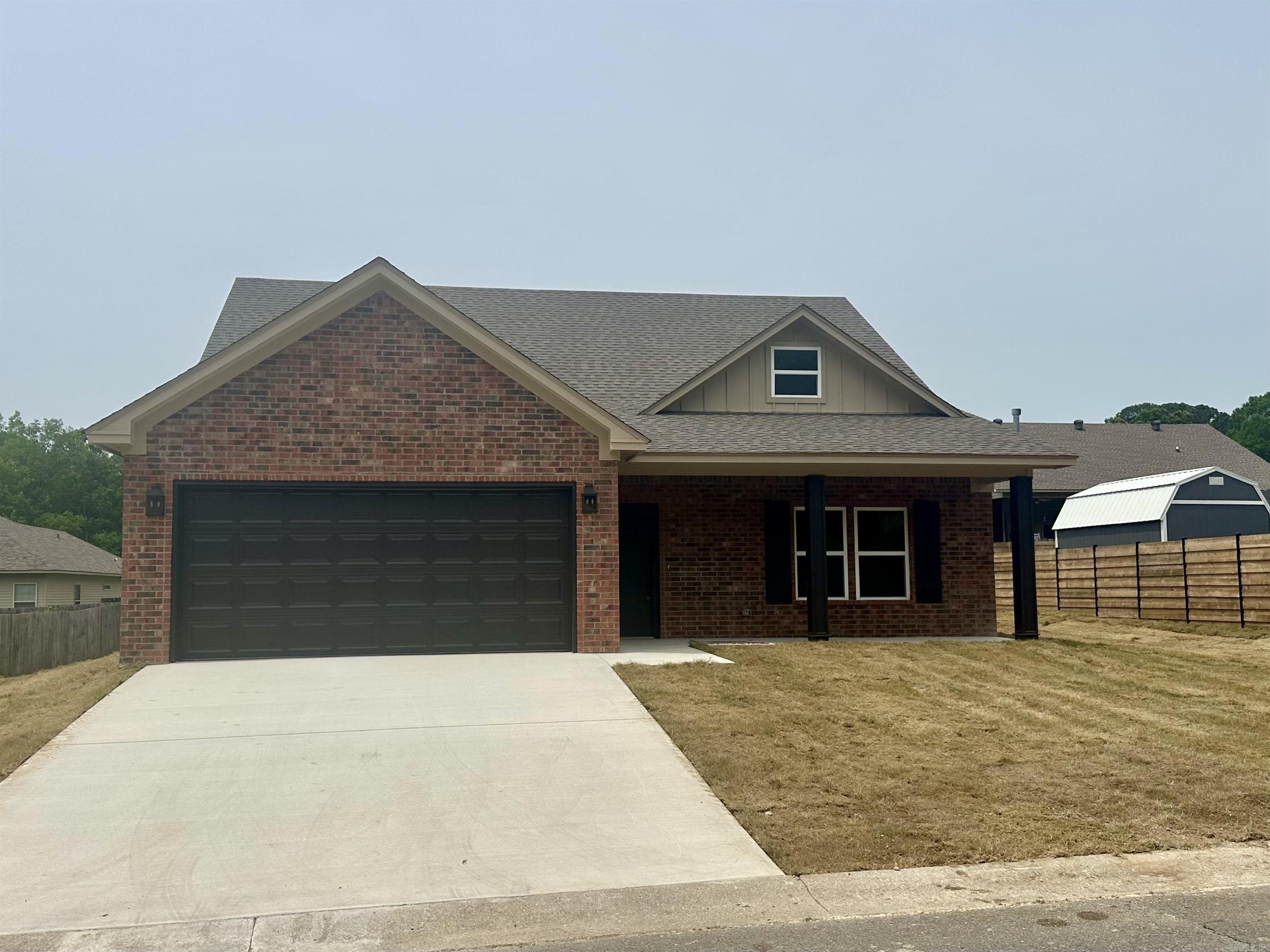 This new construction is perfect for you! It's move-in ready and located in the Lake Hamilton School District. The subdivision is close to the school, which is super convenient. Inside, you'll find vinyl plank flooring and beautiful granite countertops in the kitchen and bathrooms. The soft close drawers and cabinets add a touch of luxury. The primary bath even has his and hers closets! Outside, there's a covered back porch and all new sodded lawn (just put down). Plus, the community offers a pool and a basketball court for you to enjoy.And don't forget, there's a 1-year builder's warranty for peace of mind. It's a dream home!