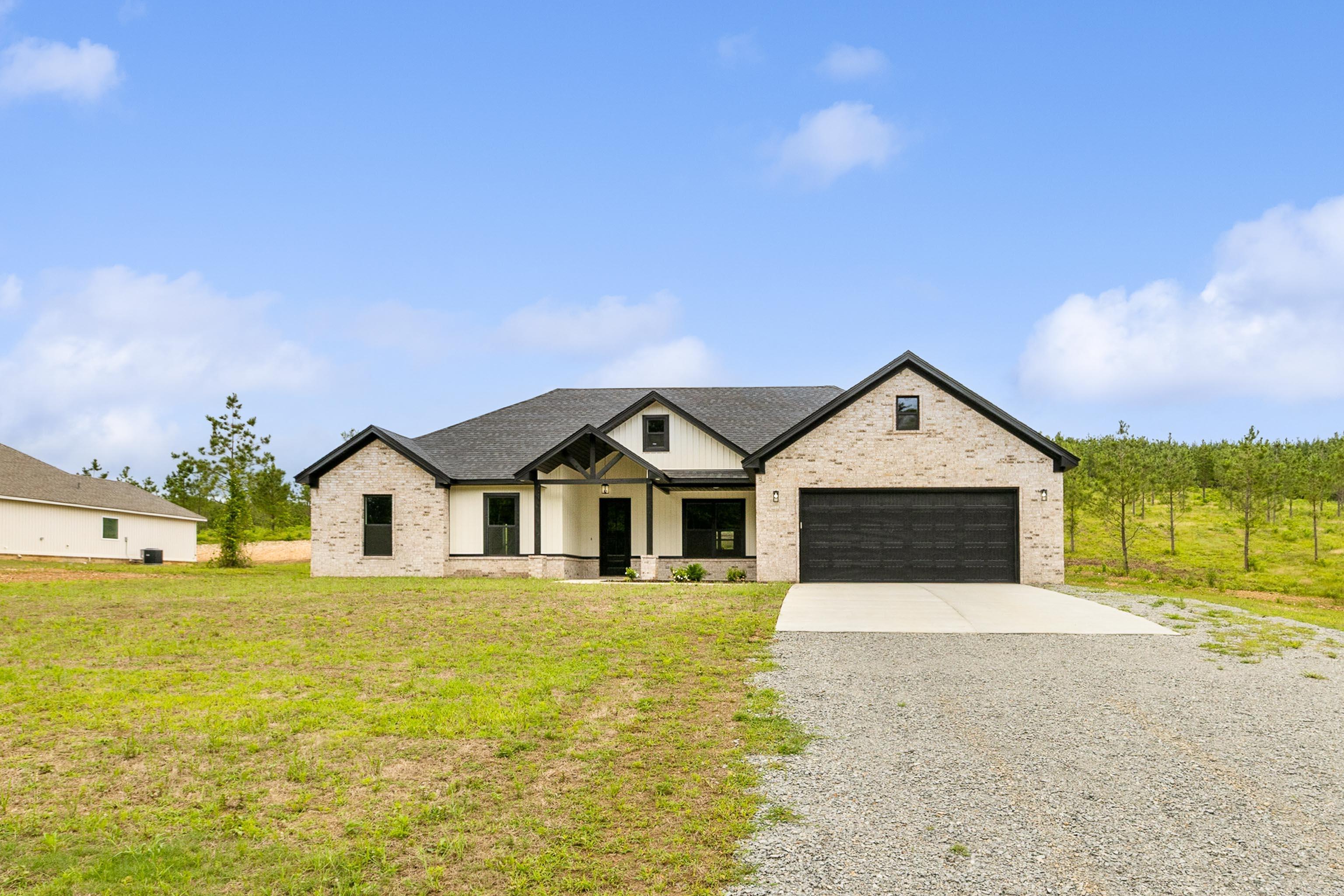 Welcome to a Beautiful new home in a favorite area!! Bryant schools or school choice. Country atmosphere on 2.10 acres. 4 beds 2 bath. Master bath has a large soaking tub for the long days. Bright kitchen and living area with brick fireplace. Beautiful accent wall in living room. Large covered patio area for outdoor gatherings. Quiet and peaceful on 2.10 acres.