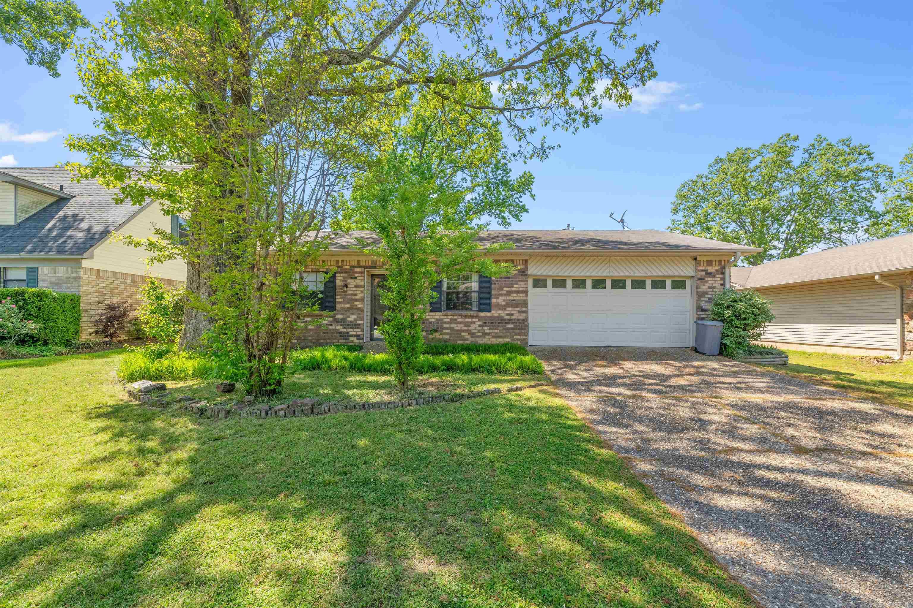 ADORABLE 4 Bedroom, 2 Bathroom home is READY FOR you! This house is located on a quiet street and has so much to offer! Recently the HVAC was replaced and the seller also had a mini-split added to the primary suite for maximum comfort! Upon entry you are greeted with a lovely living area that can be a multi-purpose room. All 4 of the bedrooms are on the left side of the home with the primary suite at the end of the hallway - tucked away for privacy! The en suite features a jetted tub and a designated Make-Up area! On the opposite side of the home you will find the darling kitchen that overlooks the fully fenced backyard! This space offer plenty of counter space and storage! Another bonus of this kitchen is that it is open to the back den making this a great area for entertaining! This den features a lovely fireplace and the room is accented with 2 statement wooden beams creating a classic charm! Just outside you will find a delightful patio space to enjoy the backyard! There is also a spacious storage shed that conveys AND a concrete pad for a play space for basketball or for working on projects! This home is a MUST see! Call today for your private showing! See Agent Remarks!
