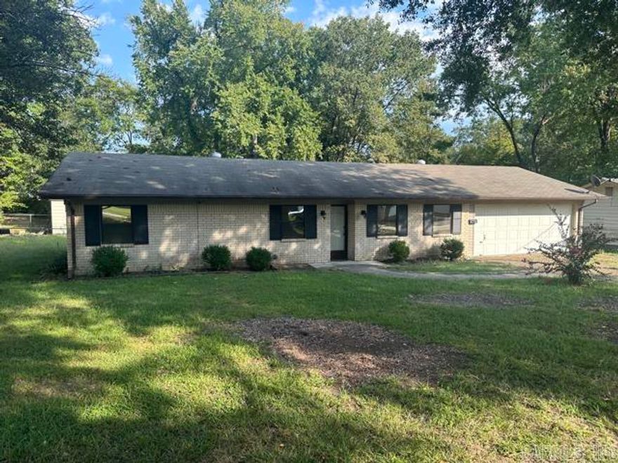 Come see this solid 3 bed 2 bath home perfect for a first time home buyer or someone wanting to add value with a few cosmetic upgrades. Close to downtown, schools,  shopping, the River Center, and easy access to I-30 via South St.  Enjoy your morning coffee in the sunroom or use it for extra space to entertain guests.  The back yard is large, fully fenced, has a storage building, and even a covered porch.  All this for under $200,000!  Schedule your showing today.  AGENTS SEE REMARKS.