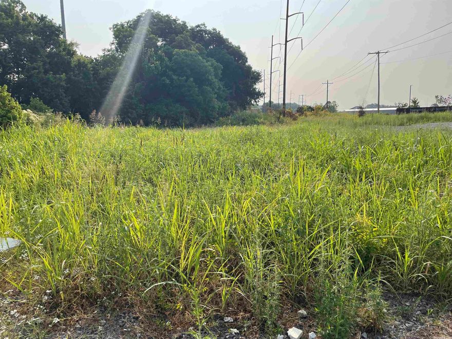 Current survey shows to be .17 acres on S Oak behind Thompson Recycling.   Make a great lot for food truck