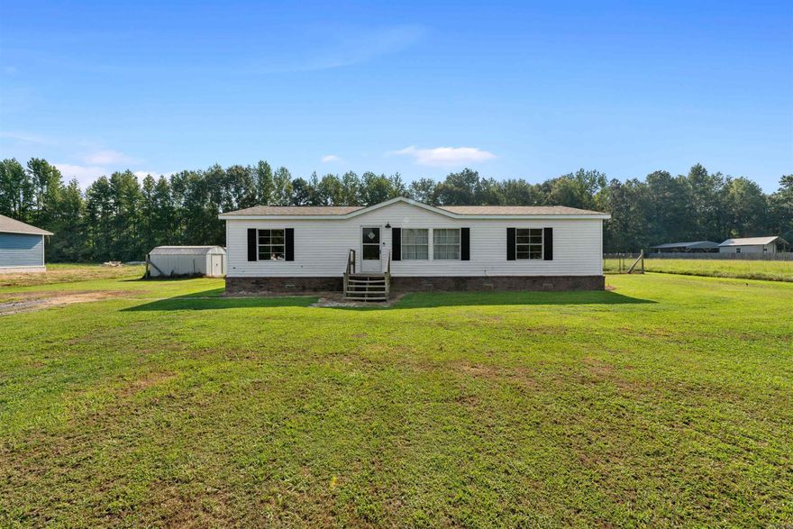 Take a look at this 3 Bedroom, 2 Bath home on nearly an acre of land in Austin! Enjoy the luxury of space with a generously sized lot that provides you with room to roam, garden, and create your outdoor haven. The possibilities are endless!  Step into a beautifully updated living space featuring an interior that seamlessly combines modern aesthetics with comfortable living. The heart of this home is the gorgeous kitchen, complete with sleek countertops, new appliances, and ample cabinet space. Cooking and entertaining have never been more enjoyable. Go see and experience the charm of this unique property firsthand! Roof 2023