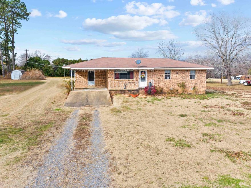 Welcome to a charming 3-bed, 1-bath home in Marshall, Arkansas. Set on a level one-acre lot, this cozy residence offers simplicity and potential. The beautiful kitchen with updated cabinetry & dining area open to the living room, creating a practical living space with a propane fireplace. The spacious backyard provides room for outdoor activities and a patio for entertaining or a peaceful place to drink your morning coffee - plus a shed for storage. Discover the ease of small-town living in this ideal home.