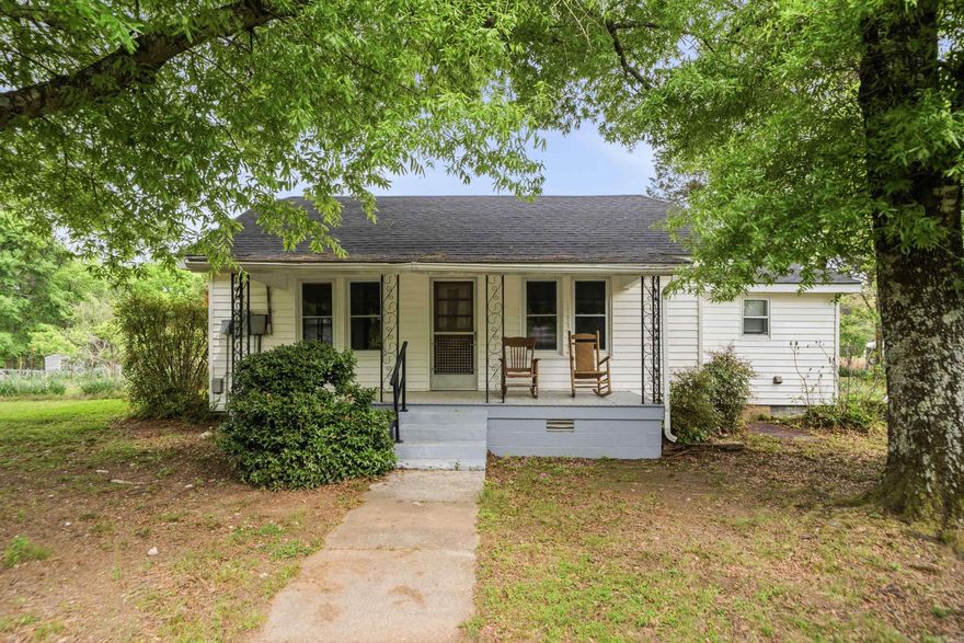 Discover over 21.66 beautiful acres in the heart of Hot Springs, Arkansas, offering the perfect blend of country living and convenience. Bring your cows, horses, and farm animals—this property is ready for your rural lifestyle dreams. Enjoy an established variety of fruit trees and vines including peach, pear, fig, plum, and grapes. A small pond adds charm and potential, while the spacious garden area is perfect for growing your own produce.  The cozy 2-bedroom, 1-bath home offers 1,214 square feet of comfortable living space with a warm wood-burning stove, three mini-split units for efficient cooling, and a brand-new roof for added peace of mind. Additional improvements include a nice barn, 38' x 24' workshop/garage and carport, providing plenty of storage and functionality.  Whether you’re looking for a mini farm, homestead, or private retreat close to town, this unique property offers endless possibilities.