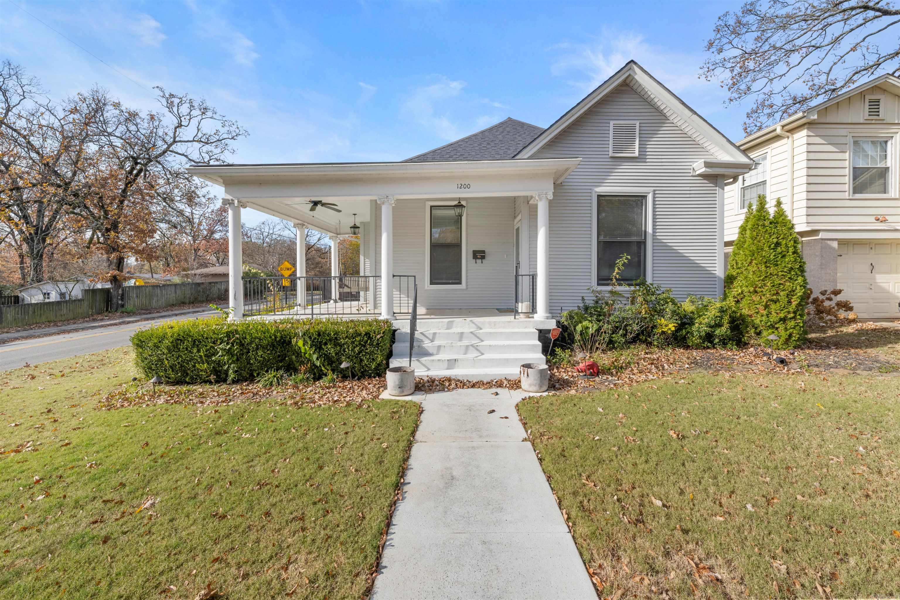 Step into the charm of 1915 with this Hillcrest gem, blending timeless character and modern updates. The main house showcases original wood floors, a spacious primary suite with a luxurious en-suite bath, including a walk-in shower, whirlpool tub, and large walk-in closet. The beautifully updated kitchen features a gas cooktop, farm sink, granite countertops, and a built-in microwave. Adjacent is a dry bar/coffee bar complete with a wine fridge and space for a second refrigerator, ideal for entertaining. A second living area at the back provides a cozy retreat for family gatherings or relaxation. The detached garage offers off-street parking and ample storage. Above it, a fully equipped apartment with a living room, bedroom, full bath, kitchen, and washer/dryer is perfect for guests, in-laws, or rental income potential. Located just a block from Prospect Terrace Park, enjoy swings, a slide, and picnic spaces for outdoor fun. Own a piece of history with this Hillcrest treasure, offering modern comforts in a sought-after neighborhood. Schedule your tour today!