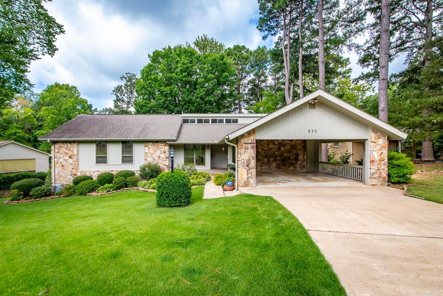 Greers Ferry Lake is literally a stones throw away from this property.  Walk to the lake a cool off.  The water is clear and refreshing. A great, well maintained, loved home with plenty of room and decks for entertaining family and friends. Primary bedroom has office/baby's room and kitchen, a butlers pantry.  Exterior of home was recently painted. Home offers a shop/safe room/man cave under the house.  This is one of the nicest neighborhoods and it's conveniently located to all amenities.