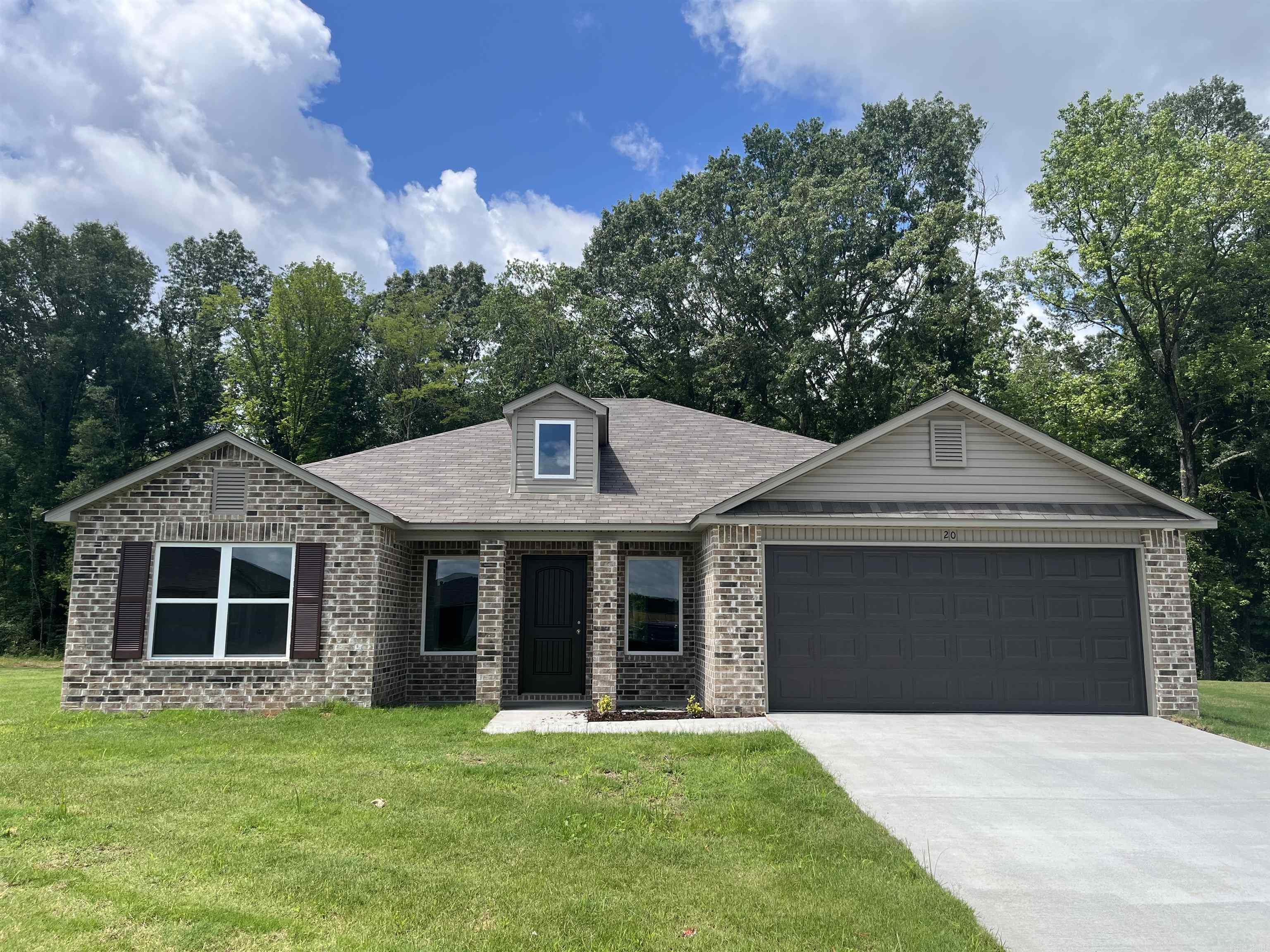 The gorgeous Washington plan is loaded with curb appeal with its charming covered front porch, brick columns, and arch-top windows. This home features a split floor plan with 4 bedrooms, 2 bathrooms, an inviting entryway, a spacious master suite, and a stunning kitchen/dining area fully equipped with energy-efficient appliances, ample counter space, and a convenient pantry. Learn more about this home today! **SEE SHOWING REMARKS & AGENT REMARKS FOR IMPORTANT INFORMATION**