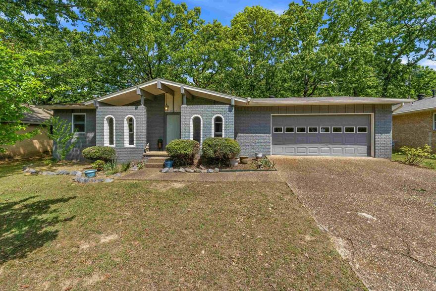 Welcome home to this absolutely adorable, move-in ready gem full of charming “Granny Chic” character and modern updates! This 3-bedroom, 2-bath home offers a warm and inviting layout with a cozy front living room and a spacious back family den featuring a beautiful brick fireplace—perfect for relaxing or entertaining.  You’ll love the peace of mind that comes with major updates already completed, including HVAC and Water Heater (both 2021), along with all new, updated windows throughout the home. The two-car garage adds convenience, while the fully fenced backyard provides privacy and space to enjoy the outdoors.  Step outside to a great patio just off the back den—ideal for morning coffee or evening gatherings—and don’t forget the storage shed, which conveys with the property!  This home is full of personality, comfort, and charm—truly a must-see. Come take a look today!