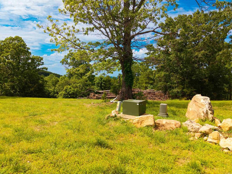 Discover the perfect setting for your dream home on this approximately 1.5 acre homesite nestled in a beautiful, established subdivision. Enjoy paved streets, underground utilities, and the peace of a thoughtfully planned community. This exceptional lot offers sweeping countryside views, is just minutes from lake access, and is surrounded by high-end homes—providing both privacy and lasting value. A rare opportunity to build in a location that blends natural beauty with refined living.