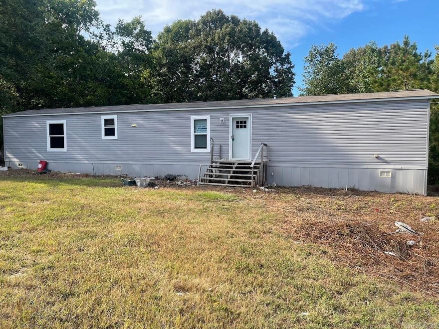 This mobile home offers a comfortable and affordable living option with plenty of potential. Featuring 3 bedrooms and 2 bathrooms, this property is situated on a spacious lot, providing room for outdoor enjoyment, gardening.