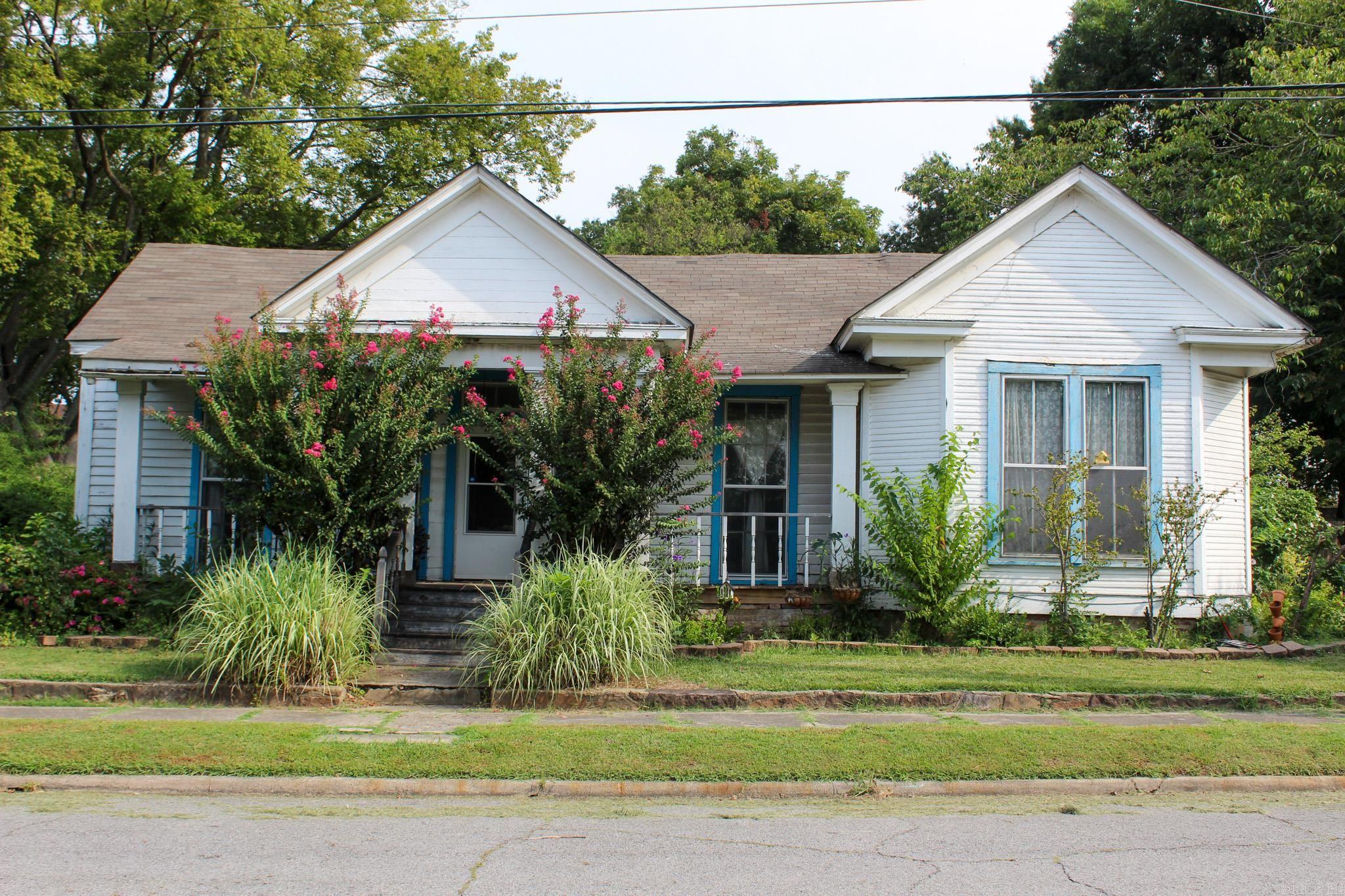 In 1985, the house was listed on the U.S. National Register of Historic Places, ensuring its preservation for future generations. This designation not only recognizes the architectural and historical significance of the house but also highlights its role in the broader narrative of American history. While this home is in need of some repairs and updating, the character and history it offers are unparalleled. Located just a minute from downtown Searcy and a short walk to Harding University's campus, this house presents an excellent investment opportunity for a history buff or someone looking to expand their investment portfolio. The back windows have recently been replaced, enhancing the natural lighting in the home. The large windows create a serene atmosphere, making the interior feel warm and inviting. Additionally, the home boasts numerous built-ins, adding to its charm and functionality. The Hicks-Dugan-Deener House is not just a piece of history; it's a vibrant part of Searcy's cultural landscape. Whether you're captivated by its architectural beauty or its historical significance, this home offers a unique opportunity to own a piece of American heritage. Let's go take a look!