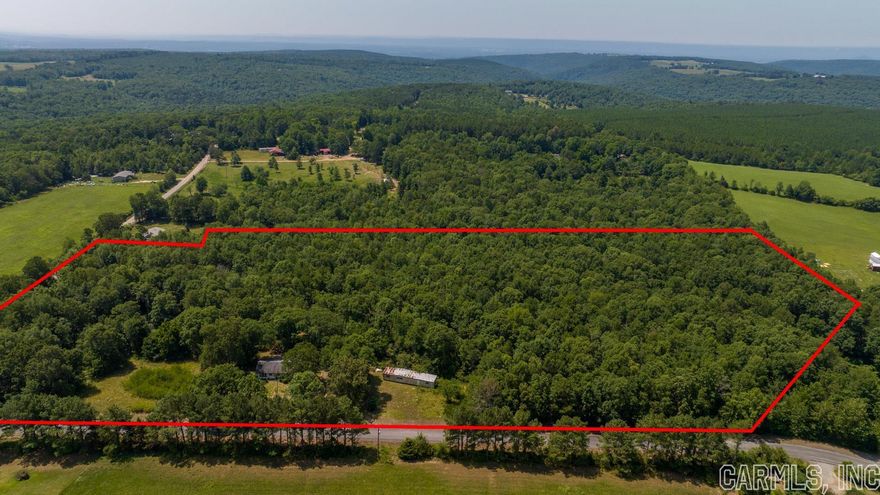 Check out the video on YoutTube! Escape to your own secluded paradise on this breathtaking 17.2-acre wooded property in Drasco, AR! Minutes away from the picturesque town of Heber Springs and the sparkling waters of Greers Ferry Lake, this prime location offers the ultimate retreat for outdoor enthusiasts and tranquility seekers alike.  As you enter, be captivated by the serenity that surrounds you. The towering trees provide a natural canopy, transporting you to a world of peaceful seclusion. The property benefits from the convenience of electric and water already available on site, saving you time and expense.  Located on a paved road, accessing this parcel is a breeze year-round.  As you explore, you'll encounter a diverse array of wildlife, including deer and other wildlife.  Beyond the boundaries of this property, adventure awaits. Just a short drive away are the natural wonders of Greers Ferry Lake, renowned for its encaptivating waters and recreational opportunities. Spend your days boating, fishing, or soaking in the sun on one of the many picturesque beaches.  Embrace the tranquil lifestyle and majestic beauty of Drasco, AR. Claim your place in nature today! *See remarks