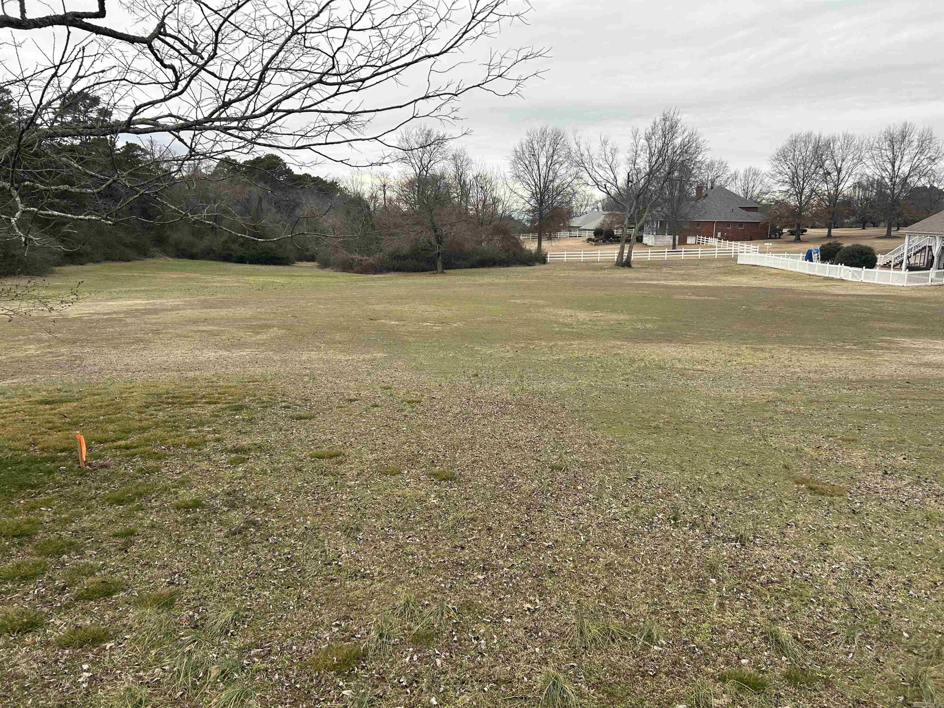 **Prime Vacant Land in Established Subdivision - 1.5 Acres Near Lake Dardanelle** Discover the perfect canvas for your dream home on this expansive 1.5-acre cleared building lot, nestled in a charming established subdivision just minutes from town. With easy access to amenities and recreational opportunities, including the scenic Lake Dardanelle, this property offers the ideal blend of tranquility and convenience. Imagine designing your ideal residence in a peaceful setting, surrounded by nature yet close to shopping, dining, and outdoor activities. Whether you envision a serene retreat or a vibrant family home, this lot provides endless possibilities. Don't miss your chance to secure a slice of paradise in a desirable location. Contact us today for more information.