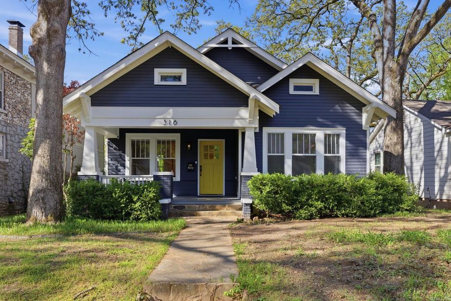 Tucked on a highly desirable street in Hillcrest and just moments from shops and restaurants, this beautifully updated 2 bed/2 bath home blends historic charm with modern convenience. Each bedroom features its own en suite bath—ideal for roommates or a potential Airbnb setup. Major updates include the kitchen, bathrooms, electrical, exterior, refinished hardwood floors, and select windows, offering peace of mind for years to come. The kitchen is a standout with quartz countertops, custom cabinetry, and GE appliances, while all plumbing fixtures throughout the home are Kohler. The primary suite includes a walk-in closet, and the home is filled with character including built-ins, hex tile floors, a window seat in the dining area, and a cozy brick fireplace. Enjoy outdoor living on the covered front porch with charming haint blue ceilings or entertain guests on the spacious covered back deck with ceiling fans, overlooking a fully fenced backyard. Additional features include a sprinkler system, Ring camera system, roof (2019), and HVAC (2008). Zoned for Pulaski Heights Elementary and Middle, and Central High, this move-in ready home is a rare find at an attractive price.