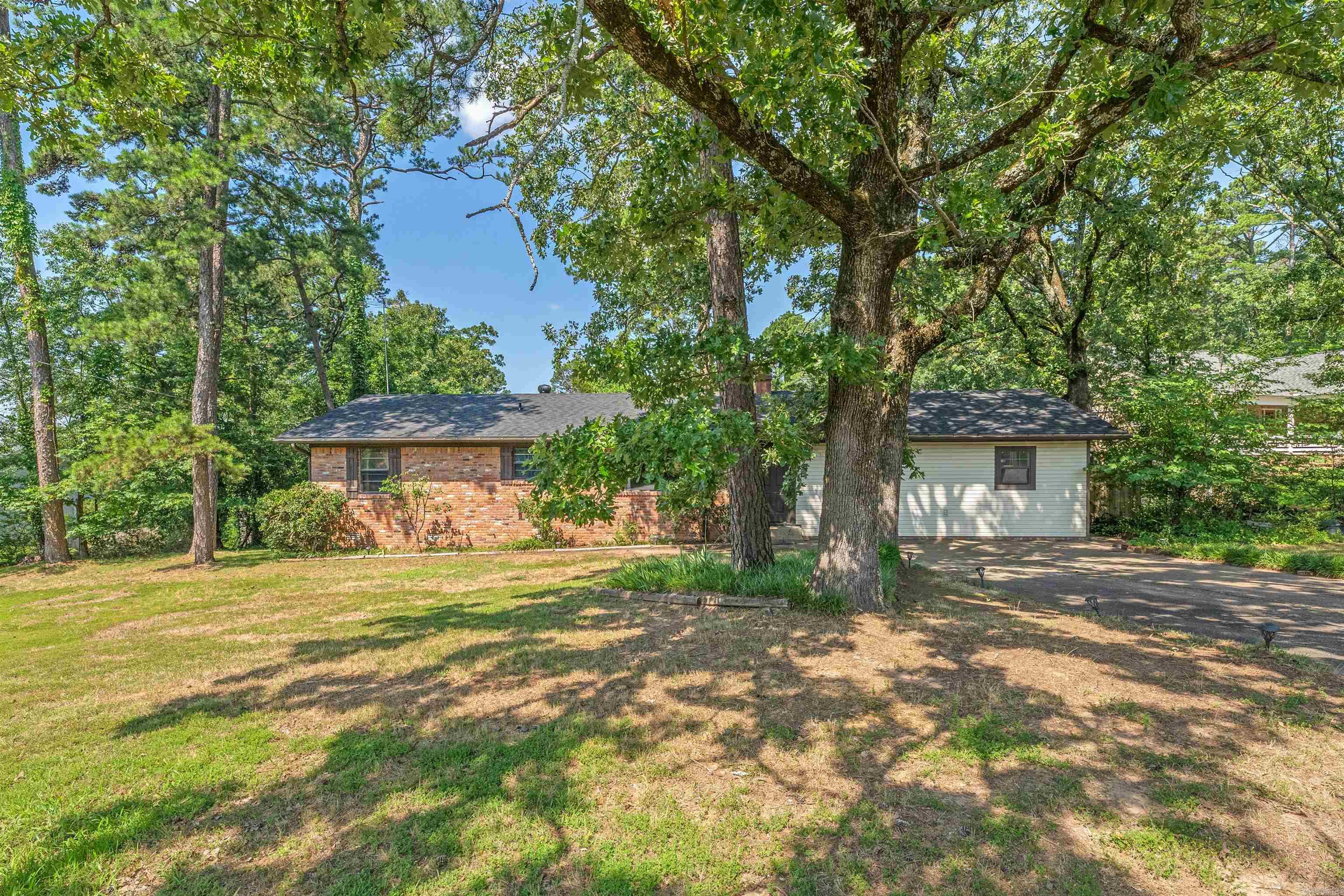 This charming 3 bedroom 1.5 bath home has endless potential! Step inside this inviting home that offers 3 spacious bedrooms ready for your personal touch. With solid bones and functional layout, this property provides a fantastic opportunity for first-time buyer's, investors or anyone looking to bring their vision to life. This home is full of character and just waiting for the right owner to make it shine. Situated in an established neighborhood, this home offers a great backyard space with a covered deck with built in bar. living area and plenty of potential to make it your own. YOU DON'T WANT TO MISS THIS ONE!