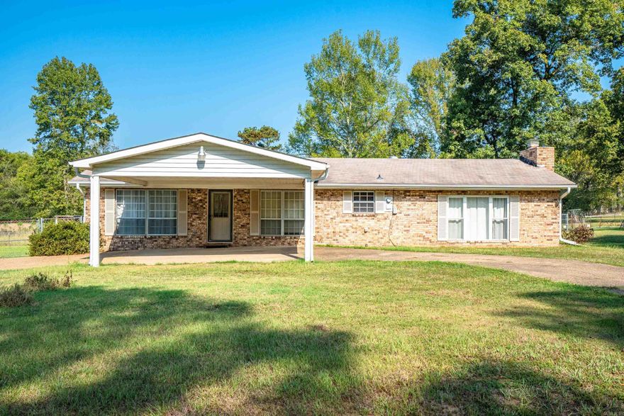 This three-bedroom, one-and-half bath brick home is nestled in a quite Fountain Lake neighborhood, yet still close to town, it is set on nearly 2.5 acres with a partially fenced yard. It's a great opportunity for anyone wanting a lovely home  with generous outdoor space. Don't miss out on this one!
