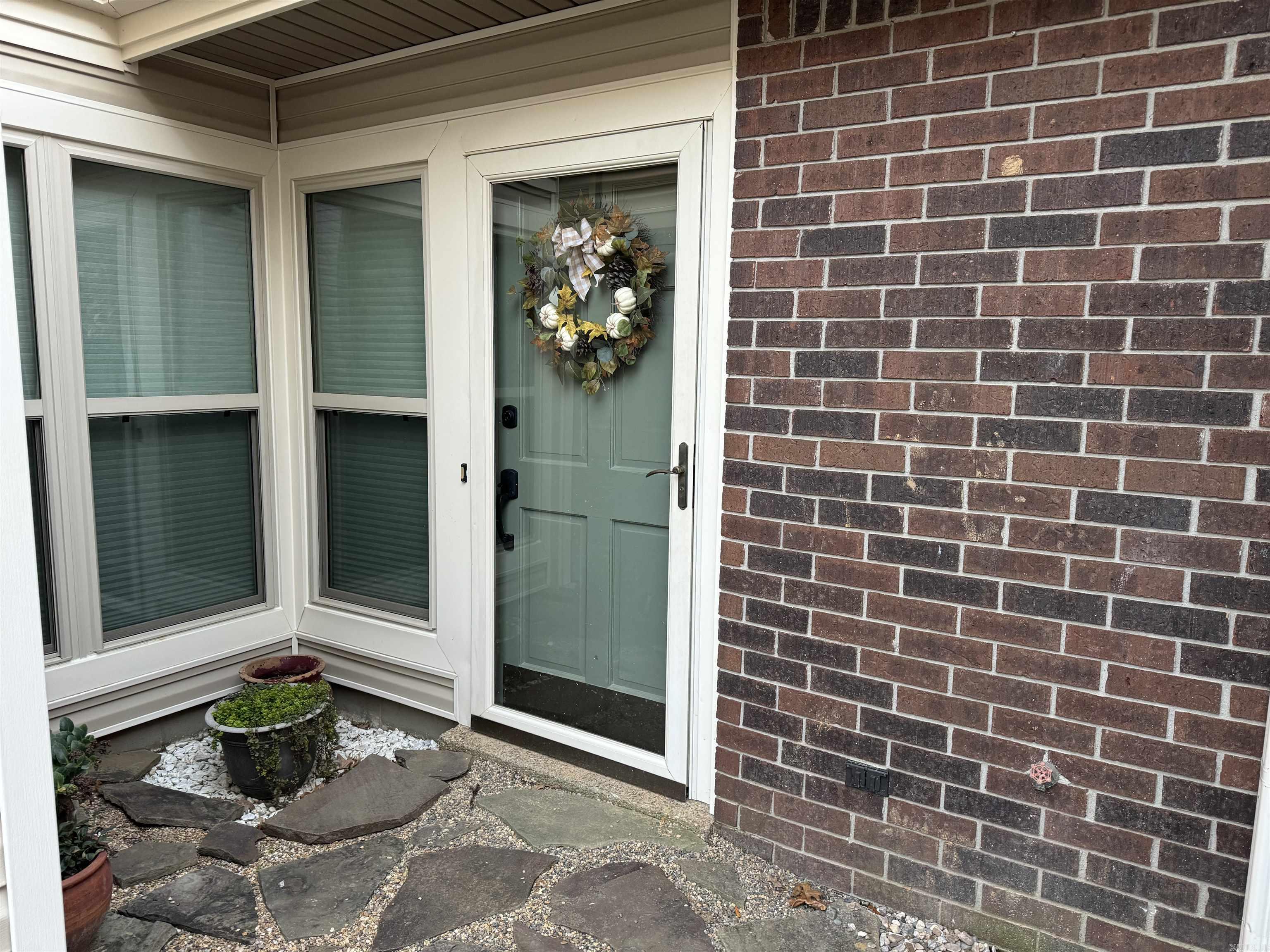 If you're looking for easy, low-maintenance living with a touch of luxury, this beautifully remodeled 4-bedroom townhome in Indian Hills is the one for you. With no yard work to worry about and the neighborhood pool and pavilion just across the street, convenience is built in. Inside, this home shines with updates throughout — new windows, luxury vinyl plank (LVP) flooring, countertops, doors, lighting, bathrooms, and a fully renovated kitchen. Even major systems like the roof, gutters, and plumbing (from the condo to the street) have been replaced. A new fence, balcony, and staircase with railing lead to the private upstairs primary suite, creating a stylish and functional layout. The main level features a bedroom and half bath, perfect for guests or a home office, along with an open-concept living and dining area and the updated kitchen. Upstairs, you’ll find three additional bedrooms, two full bathrooms, and a conveniently located laundry area. Step outside to a private patio—ideal for relaxing or entertaining. A rare find, this townhome also includes a spacious 2-car garage. A rare find indeed!