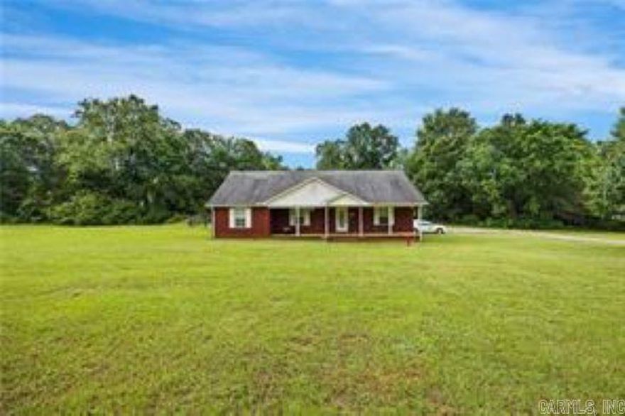Beautiful country home on 4.4 acres located just minutes from town. This home features a spacious open floor plan that makes for comfortable living. Oversized laundry room with space for exercise equipment/hobby area or simply more storage. And don't forget the like new inground swimming pool with covered back porch and large patio area. Perfect for entertaining or just relaxing at the end of the day. Additional metal building is perfect for a shop area, tools, ATV, mowers etc.