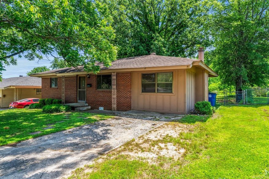 Charming 2-Bedroom Ranch with Room to Grow!  Welcome to this cozy and inviting ranch-style home, perfect for first-time buyers, downsizers, or anyone looking for a great investment opportunity. This 2-bedroom, Could be a 3 bedroom,  1-bath gem features a spacious fenced yard—ideal for pets, play, or gardening—and a wood-burning fireplace that adds warmth and character to the living space.  Recent updates include a brand new tankless water heater, new kitchen appliances, and a dedicated laundry room with the potential to convert into a third bedroom or home office.  Don’t miss your chance to own a home with great bones, modern upgrades, and tons of potential—all in a charming, single-level layout. Whether you're looking to settle in or invest, this property is full of possibilities!