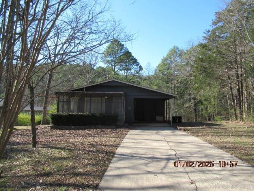 Spring into the perfect place to call home! This 2 bedroom 1 bath home is surrounded by nature.  Front screened porch and back heated patio room allow you to enjoy morning coffee and/or meals.  Open style living room and kitchen.  Carport with extra storage, heated laundry room, backyard storage shed, lots of space to have a garden.  5 minutes from boating and fishing, READY TO CLOSE! The new price is below recent appraised value, move-in ready or add your own personal touches first.  Call to see it today! AGENTS SEE REMARKS.
