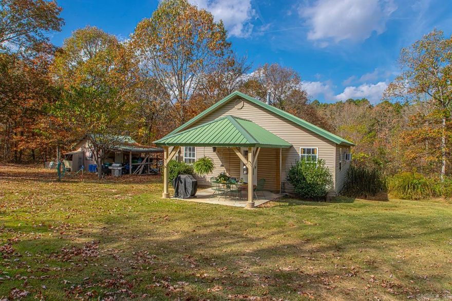 This beautiful 7.58 acre lot boasts a cute little bungalow with 2 bed and 1.5, There is also a new 20X40 shop with an attached 10X24 bunkhouse, as well as an additional shed on the property. The main house has been recently renovated with new paint, flooring, updated bathrooms, as well as extra insulation for better climate controlled home. There is upgraded electrical system and new hot water heater as well. This property is perfect if you enjoy the outdoors and want some privacy! Schedule your private showing today!