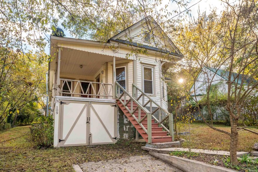 Vintage 1920's Victorian home featuring 2 Bedrooms and 1 Bath.  This home is still very original with some Victorian style slat walls, original hardwood floors, some hard wood ceilings, some original lighting features, solid wood doors and a bay window parlor/sitting room in true traditional 1920's fashion. All of this intertwined with great modern flares that include; sheetrock, ceiling fans, alarm system, tankless water heater and all energy efficient windows.  Also added in 2018: New Hvac Unit, Roof, bathtub/shower, kitchen build-ins and wooden countertops. Under the house storage, modern electric and plumbing and a gas heater in case the power goes out.  Large backyard that includes a greenhouse and planting boxes.  This house is move-in ready!