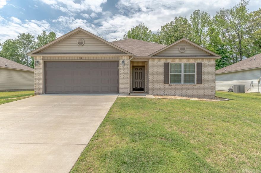 Welcome to Market 805 Elizabeth Ln in Jonesboro, AR within the Nettleton School District. Situated on 0.25 +/- acres in Brody Reed Estates Sub is a 2023 built move-in ready home wrapped in brick & vinyl siding and accented by covered front entry, landscaped rock beds, guttering, covered back patio, and a tree-lined backyard. The interior features 1,372 sf of well laid out living space and holds an open concept and split floor plan w/ 9' ceilings and luxury vinyl plank flooring. The eat-in kitchen features Ubatuba granite countertops, subway tile backsplash, bar seating, pantry storage, stainless appliances, and generous countertop space while remaining open to the living area. The primary suite holds a walk-in closet and an en-suite w/ double vanity w/ granite countertops and shower/tub combo. 2 spare bedrooms along w/ spare bathroom featuring granite countertops and shower/tub combo complete the layout. Refrigerator along w/ LG washer & dryer to convey. Conveniently located near I-555, NEA Hospital, Arkansas State University, Jonesboro Municipal Airport, and favorite retail & dining establishments. Call today to make this house your home or next addition to your rental portfolio.