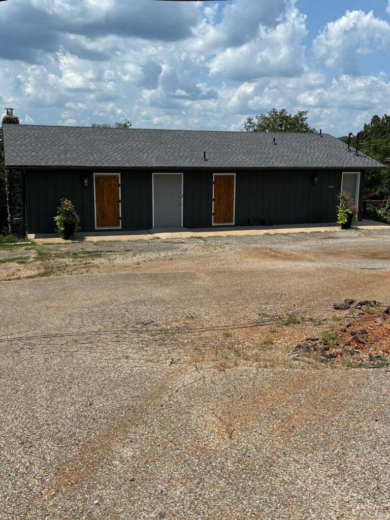 This is an opportunity of a lifetime and could be your dream come true! Take a look at this 3 bedroom, 2 bath of 1380 sq ft with 1380 sq ft above your home for the business of your choice! Could be turned into living space or used as it has been in the past, storage units! The home is newly remodeled with laminate flooring, paint inside and out. The commercial area faces one of the most highly trafficked area around on hwy 62-412 and close to the north entrance to Cherokee Village. This is one package with endless possibilities! Make it yours today. It is owner occupied and with an 8 hour notice you can see all the possibilities for yourself! 4-25 NEW ROOF!!!!!