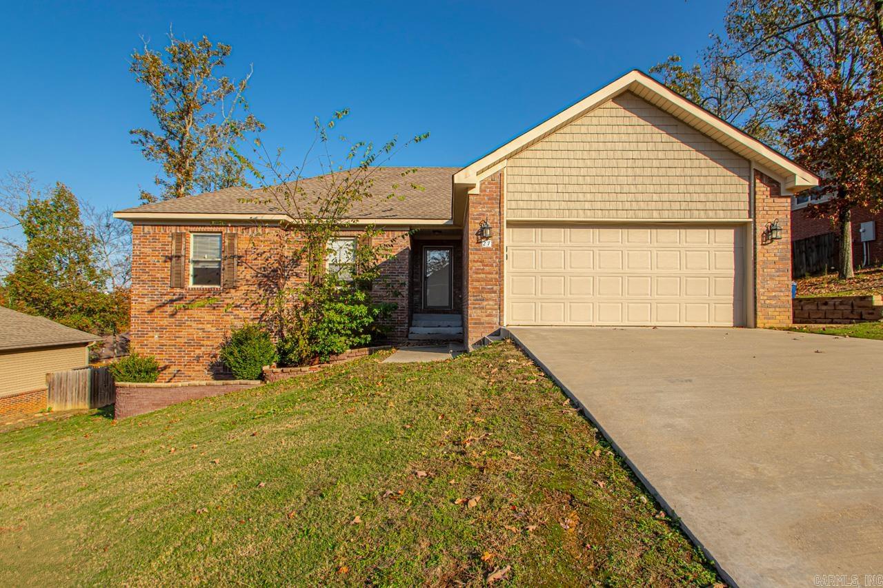 Beautiful 3 bedroom 2 bathroom brick home! Move in ready! LVP flooring throughout for easy care. Big living room with corner gas log fireplace, HUGE kitchen with tons of cabinetry! Stainless Steel appliances and large laundry room. Master bedroom has tray ceiling and double vanity space plus jetted tub/shower and fabulous master closet! Crawl space area under the home for extra storage. 2 car attached garage. Schedule your private showing today. Welcome home!