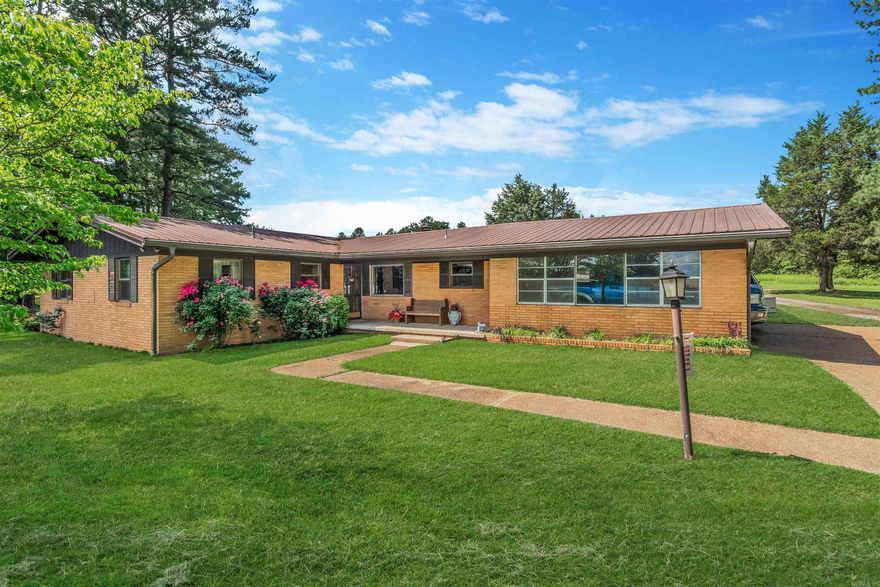 Don't miss out on this Unique, Well Maintained Property. Main house is 3 Bedroom 2 Bath est. 1636 sq ft. Nice Kitchen, Large Laundry, Bonus room for Dinning/ office or 2nd Sitting area, 3 nice size bedrooms and 2 full baths, Home was updated 5-6 yrs ago including Windows, HVAC and much more. Main bath has been completely updated with a huge walk in shower.  Out back of the Main home you will find an outdoor oasis... Large Covered Porch area overlooking a 19 x 36 In-ground Gunite Pool!!! The pool is Open and ready for you to Relax and take a swim on the hot summer days.   The Guest House (right behind the Main home) is open floor plan with space for Sitting area, bedroom and small dinning space complete with a full Kitchen and Bathroom for an additional 400 sq ft of living space, also has a view of the pool.  The rental house next door located at 6066 Hwy 36 W is 2 bedroom 1 Bath, open LR, Kitchen and has a large storage building behind it. (Currently rented out for $700.00 a Month. (est 980 sq ft).  All have metal Roofs about 16 yrs old, all on 4.68 +/- acres. Lets Make this Beautiful main home yours in time to cool off in the pool and have income coming in from the Rental Home.