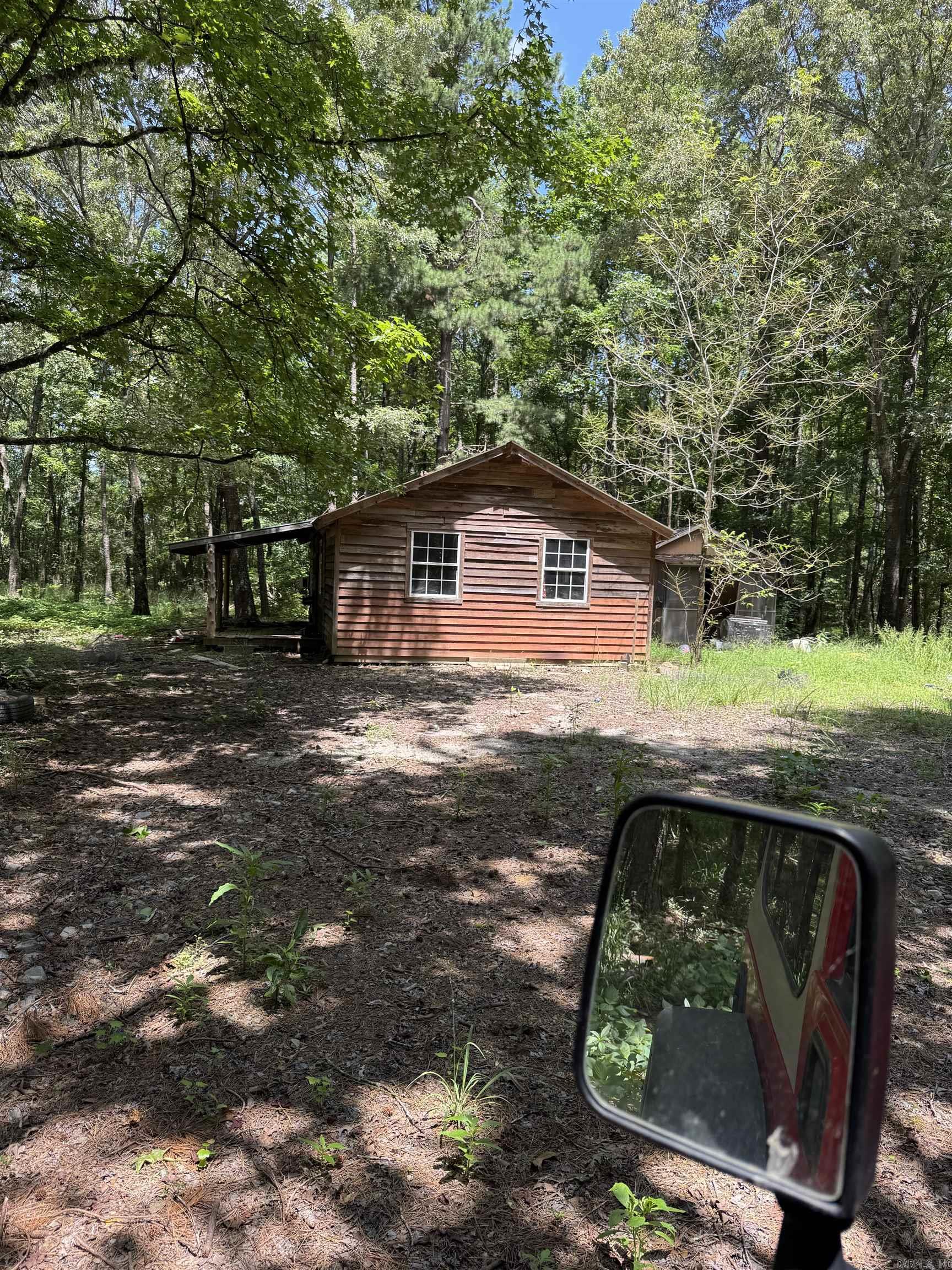 Charming Cabin on 11+/- Acres with Creek Frontage Nestled among mature trees, this cozy cabin offers privacy on approximately 11 acres of natural beauty. A serene creek borders the north side of the property, adding to its rustic charm. Recent updates include a new septic system, well, and electric, providing a strong foundation for your future plansāwhether you're looking for a weekend getaway, hunting retreat, or full-time homestead. Minutes to Ouachita National Forest. The property is being sold as-is and will require some cleanup, making it a great opportunity for those ready to roll up their sleeves and add personal touches. Donāt miss this hidden gem with tons of potential in a tranquil, wooded setting! Listing agent related to seller