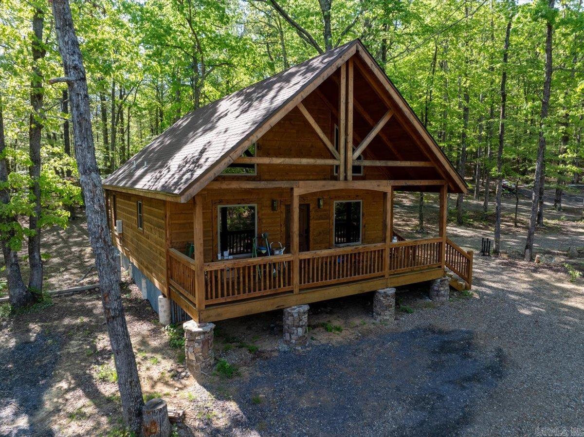 Looking for an INCREDIBLE investment opportunity with guaranteed income? Take a look at this TURN-KEY, SUCCESSFUL Vacation Cabin business just minutes from Wolf Pen Gap Trail System! Sitting on 16 acres, and backed by national forest, the property features 5 cabins, a large stocked pond & a stunning waterfall! Masterfully constructed & thoughtfully decorated, each NEW cabin boasts rustic cedar exterior, white Blue Spruce Pine interior walls, luxury vinyl flooring, full kitchen with new appliances, a spacious loft, an electric fireplace, mini splits, attractive furnishings, private back patio, & fire pits! Three cabins have hot tubs, perfect to enjoy after a day on the trails! The newest cabin is the ideal layout and location for groups, it includes 2 bedrooms w/ queen beds, a loft with an additional queen bed, a large open concept kitchen and living space, and a washer/dryer. Next door there is an RV hookup with a BRAND RV ready to rent. Property currently has an ATV rental business which adds yet another level of value to this PRIME property.Ā This property is absolutely STUNNING with so much value and potential! Donāt miss your opportunity to capitalize on Menaās ATV tourism!