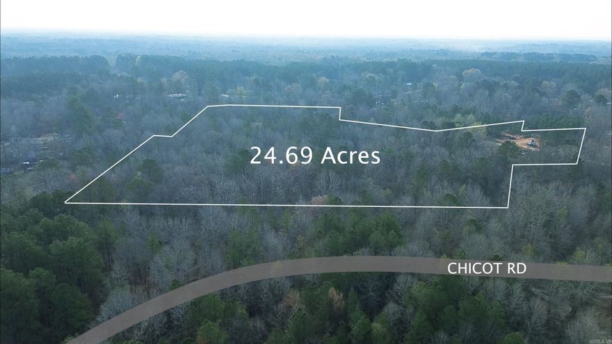 Almost 25 wooded acres located in Sheridan School District. Great opportunity for development or a secluded residential home! Platted subdivision concept available. Utilities available at street. No mobile homes allowed. Can be divided into smaller tracts.  see mls # 260009430 and 260009431 for 2 tracts at approximately 10.6 acres each and MLS#2600009432 for tract of approximately 3.38 acres ***Agents see remarks.***