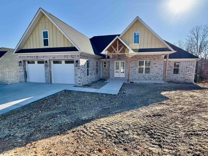 Experience the height of modern luxury in the heart of Sherwood with this exceptional 4-bedroom, 3.5-bath masterpiece, defined by unmatched style and high-end craftsmanship. The interior makes a striking first impression with soaring vaulted and beamed ceilings, while dramatic oversized windows capture panoramic views of half acre lot and flood the home with natural light. At the center of the home, the chef’s kitchen stands as an entertainer’s dream, featuring a spacious walk-in pantry and a seamless flow into the living areas. Retreat to the main-level Primary Suite, a true spa-like sanctuary offering a deep soaking tub, a custom-tiled shower with a rain shower head, a double vanity, and a separate makeup vanity. The thoughtful layout provides maximum privacy with three additional bedrooms located on the opposite side of the home, plus a versatile upstairs bonus room with a full bath—perfect for a kids hangout or guest quarters. Outdoor living is equally impressive on the expansive covered back porch, an ideal spot for taking in the quiet hilltop surroundings.  Almost complete with professional photos coming soon; please measure for square footage accuracy.