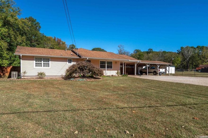 Looking for an open floor plan and spacious 4 bedrooms, 3 bathrooms, 2300 sqft+/- on 2.67acres. This mini farm is fenced and cross-fenced and is ready to accommodate all your animals. Barn with 2 stalls and separate hay/tack storage, lot's of storage, whole house generator, 2 A/C units, and much more. Covered RV Storage, shop with large covered areas and overhang for boat or tractor. Great place to raise a family and a beautiful backyard with Clear Creek flowing through the back. Ten minutes to Lake Ouachita and Lake Hamilton.
