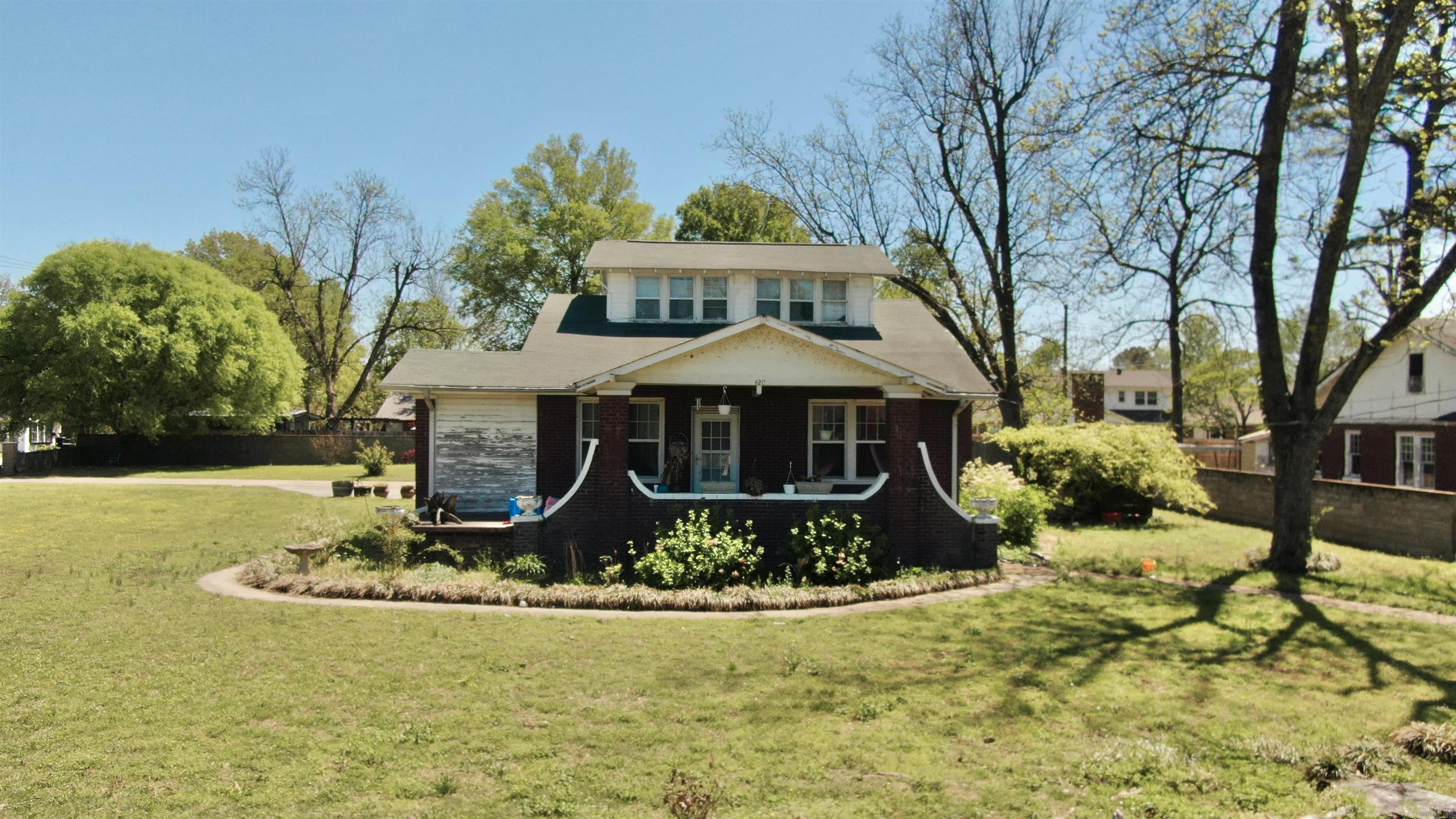 This 1,889 sq ft home, located on a spacious corner lot, could be the perfect place to make your new home! It also offers great potential as an investment property, whether you're looking to rent or flip. The large, inviting front porch is perfect for relaxing and spending quality time with family and friends. With plenty of parking, including a carport and additional parking pads, convenience is at your doorstep. Situated just a couple blocks from Downtown Walnut Ridge, you’ll have easy access to all local amenities, including hospitals, clinics, dentists, shopping, dining, and entertainment. This home offers opportunity for homeowners OR investors. With plenty of space and charm, it’s a fantastic chance to create your dream home or turn it into a profitable venture. Don’t miss out on this great property!