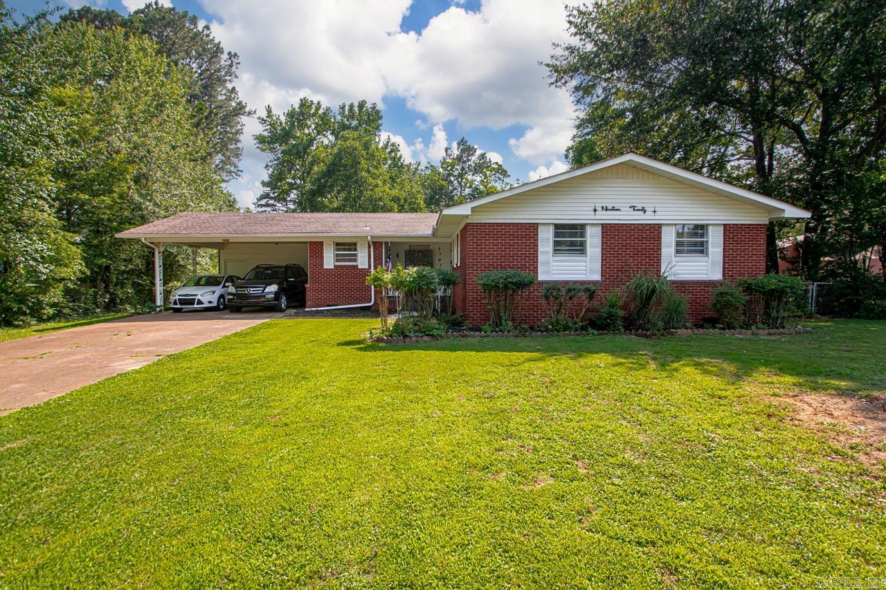 Priced $17,500 below appraisail move in with instant equity! Attached Apartment has separate entry door, kitchen & full bath. It meets the requirements with the city application to become your Airbnb or Longterm rental income stream! Ever dreamed of living in a pristine mid-century neighborhood with manicured lawns and timeless charm? Welcome to Lambert Terrace in Searcy, AR—a beautifully maintained community steps from Searcy High School and a short walk to downtown. A new pedestrian/bike path connects you to shops, events, and the farmers market. 1920 W Arch sits on one of the largest lots and features a spacious 2,116 SqFt home plus a separate-entry apartment. Main house has 3 beds, 2 full baths, and a bonus room currently used as a movie room with 12-ft screen—could be a 4th bedroom! Energy Star upgrades include new insulation and a smart thermostat. Many updates throughout, preserving mid-century charm with quality craftsmanship. Bonus: $10K in designer kitchen cabinets and basin sink included—customize your dream kitchen! This home is move in ready, schedule your showing today!