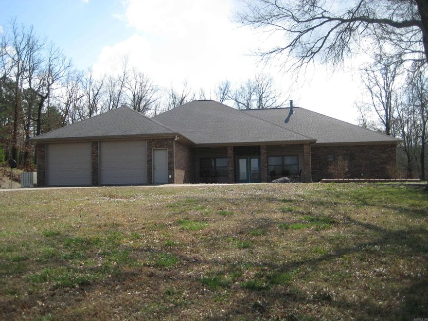 Beautiful large brick home with large rooms.  Open concept. 3bed, 2 1/2 baths.  2 car attached garage. Covered patio plus an open deck. 30 x 50 shop.