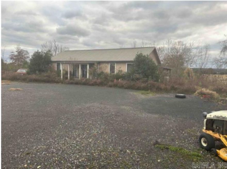 This 3 bedroom, 1 bath home sites on 1.24 acres. Home and property needs TLC and will not qualify for government loan types.