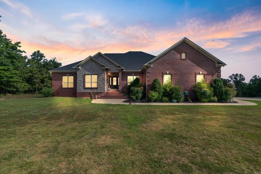 Discover the life of luxury & relaxation in this expansive estate nestled on 5ac of picturesque beauty. Grandeur & comfort on a ridge of panoramic views that will take your breath away. Int offers gourmet kitchen w Alderwood cust cabinets & slow close drawers & doors throughout. Granite counters, SS appl, commercial refrig, farmhouse sink & more! 5BR!.  Baths have poured Marble. Every room has a view! Very lg safe room downstairs w a smaller safe inside-FEMA app. Relax on the massive covered back porch and count the hummingbirds! HVAC  is geothermal w 3 zones-what an upgrade!  Shop is an expansive 50x60 & is a haven for hobbyists & tinkerers alike. Whether youre a woodworker or simply need extra space this is the perfect place!  Above the shop there is a private in-law quarters w appr 1300 SF- 2BR/1.5 Ba w small office, also has silestone counters. Shop has 220V for camper hook up w sm sewage hook up as well. Roof/gutters new in 2022. With its harmonious blend of sophistication & beauty this home is more than a home-it's a lifestyle of paradise & country escape. Many more upgrades than listed - agents see remarks & attached amenity sheet