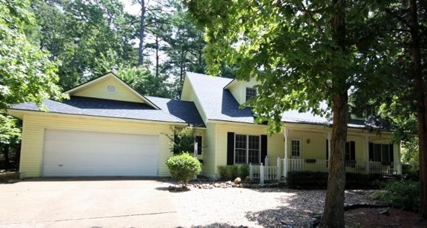 2 Story home with 2 bedrooms & a full bath upstairs and everything else you need is on the main level. Kitchen has a built-in Jenn Aire Grill & lots of cabinets. There is a spacious covered porch with a swing on the front and the back features a wonderful covered patio. Living area has windows across the back looking out on to the patio & shaded fenced back yard. Outdoor shed can be used for storage or possibly a workshop.  In an estate so there is no seller's disclosure