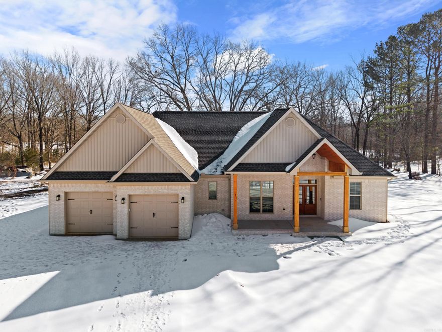 Welcome to this exquisite all-brick home, constructed in 2026, nestled on a sprawling 5-acre lot. This stunning property boasts a harmonious blend of luxury and functionality, featuring elegant tongue and groove porch ceilings and luxury vinyl plank flooring throughout. The master suite is a sanctuary of comfort with a spacious walk-in tile shower, his and hers vanities, and an expansive walk-in closet. Culinary enthusiasts will appreciate the sophisticated kitchen, complete with custom cabinets, quartz countertops, a butler pantry, an electric stove, and a double wall oven. This home is a masterpiece of modern design and craftsmanship, offering a serene retreat with all the comforts you could desire.